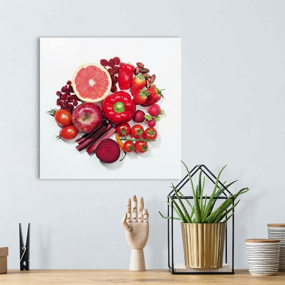 A bohemian room featuring A selection of red fruits & vegetables.