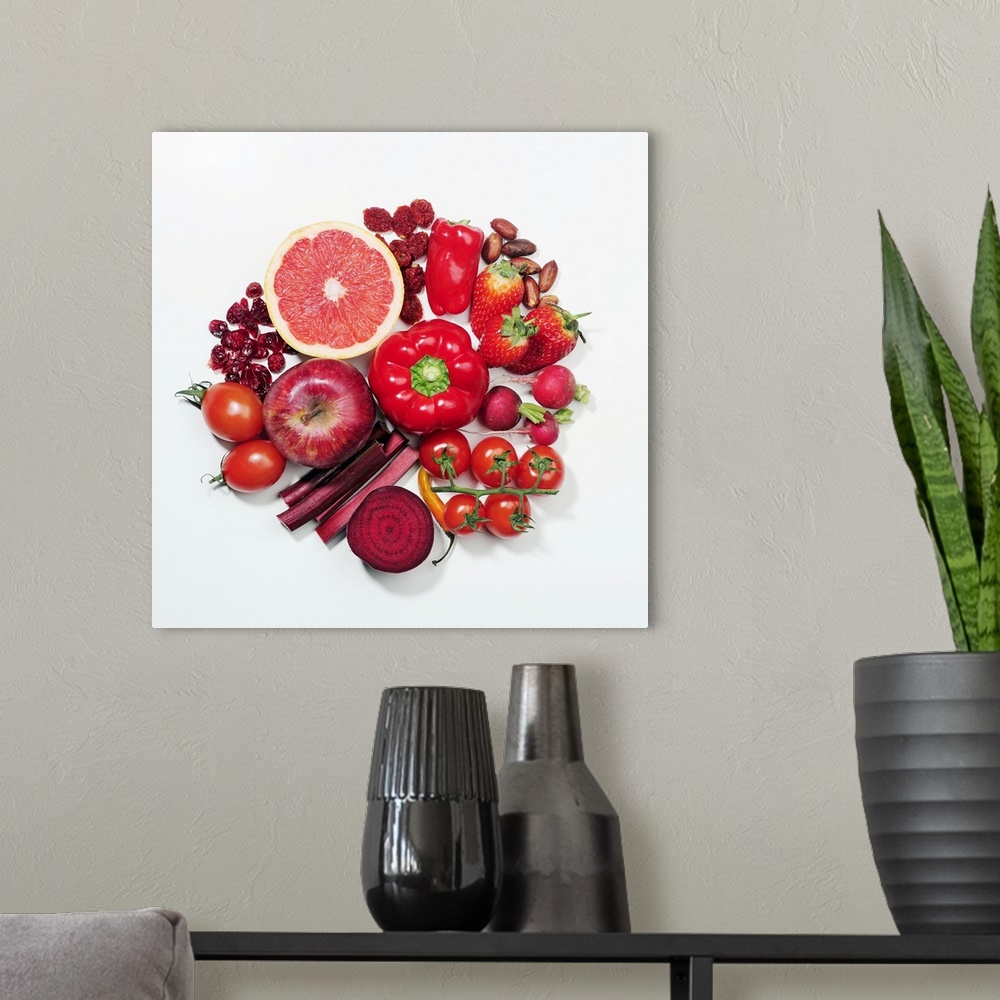 A modern room featuring A selection of red fruits & vegetables.