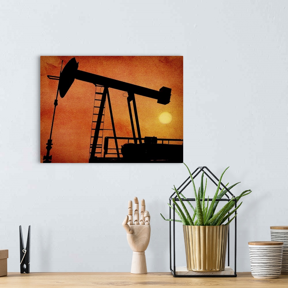 A bohemian room featuring A silhouette of an oil rig
