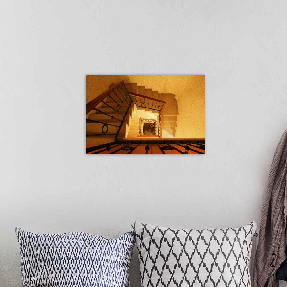 A bohemian room featuring A stairwell