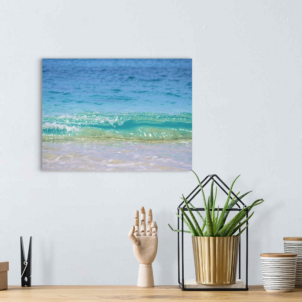 A bohemian room featuring A wave rolling into the shore of Waikiki Beach in Hawaii