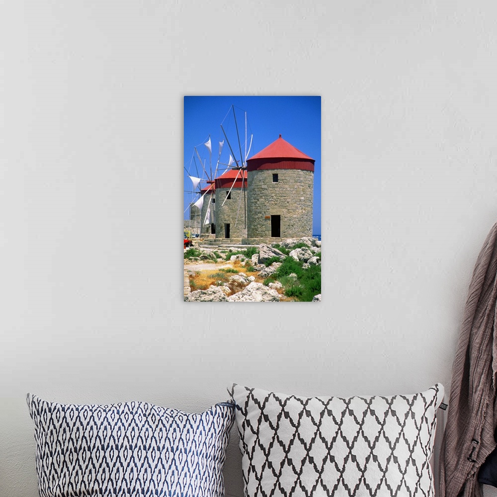 A bohemian room featuring Low angle view of a windmill at Mandraki Harbor, Rhodes, Greece