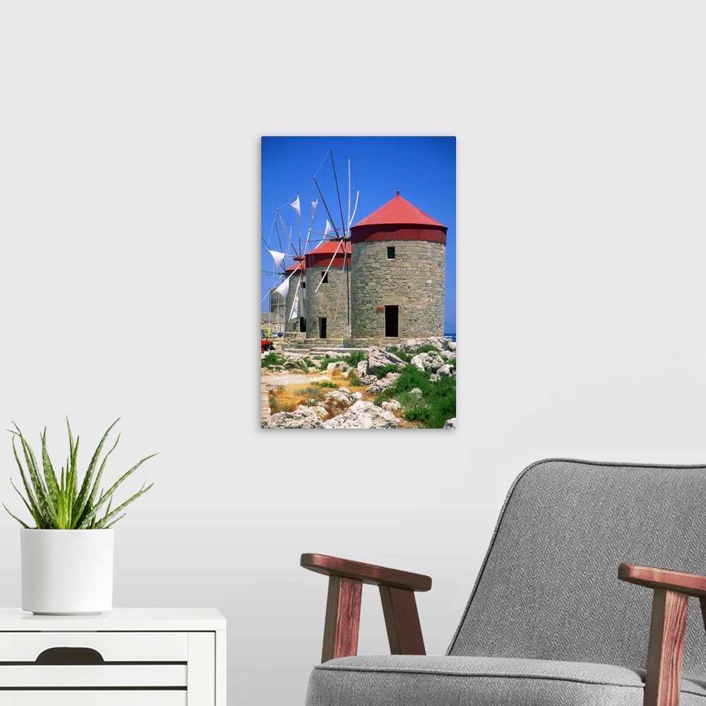 A modern room featuring Low angle view of a windmill at Mandraki Harbor, Rhodes, Greece