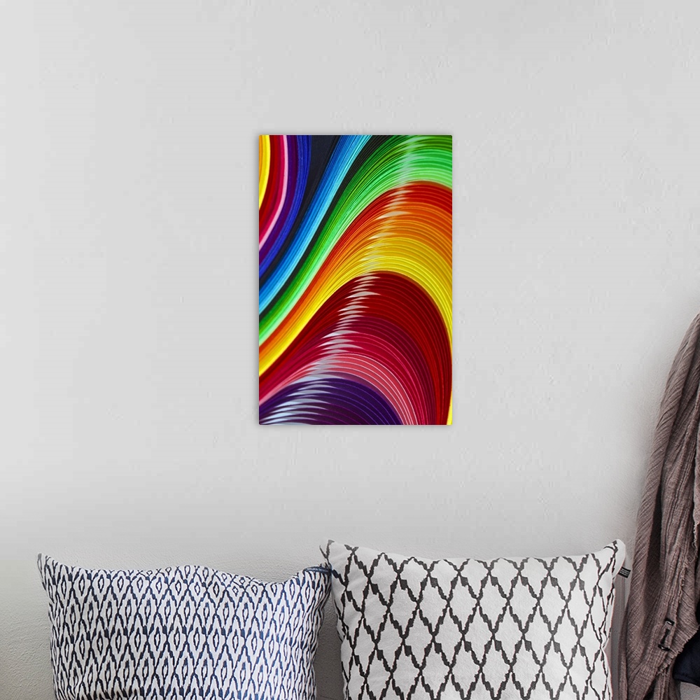 A bohemian room featuring Abstract of colored paper strips.