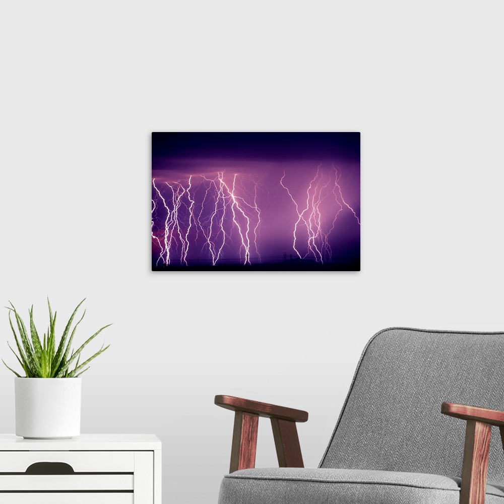 A modern room featuring Abundance Of Lightning Strikes Near Tucson
