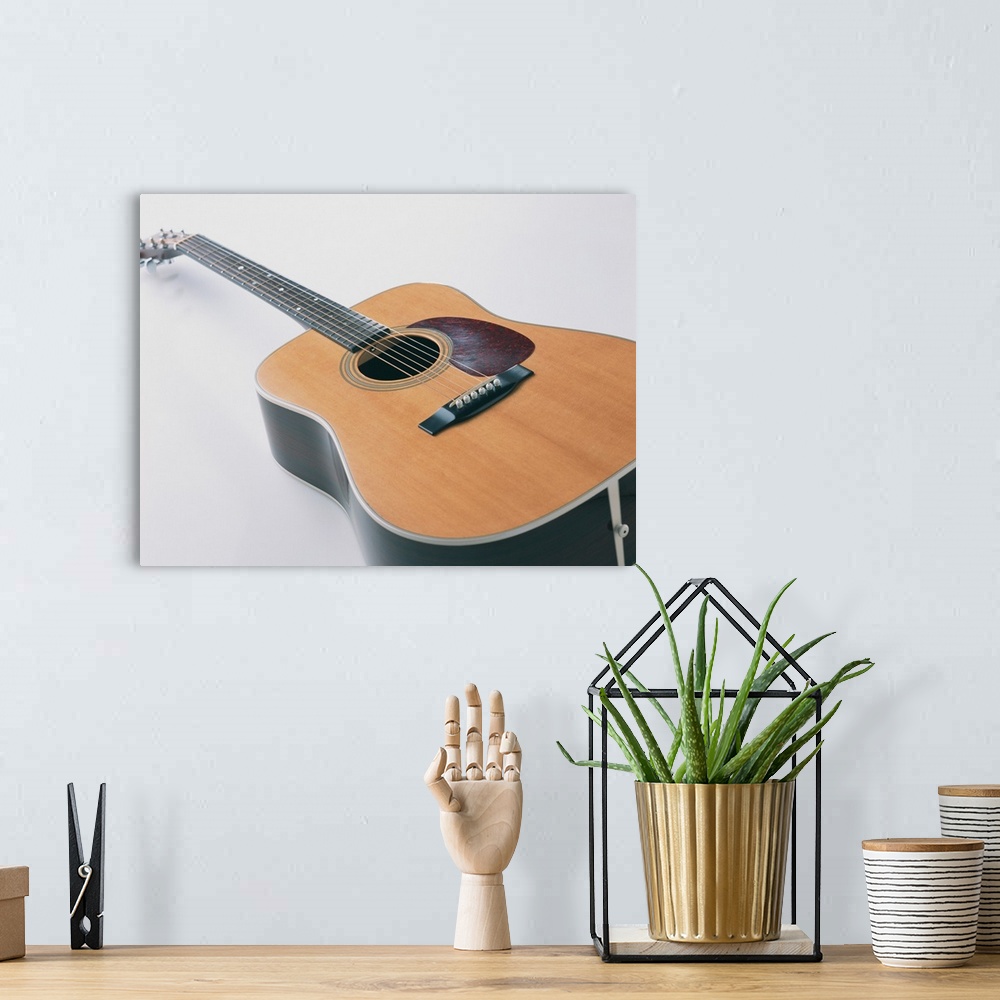 A bohemian room featuring Acoustic Guitar