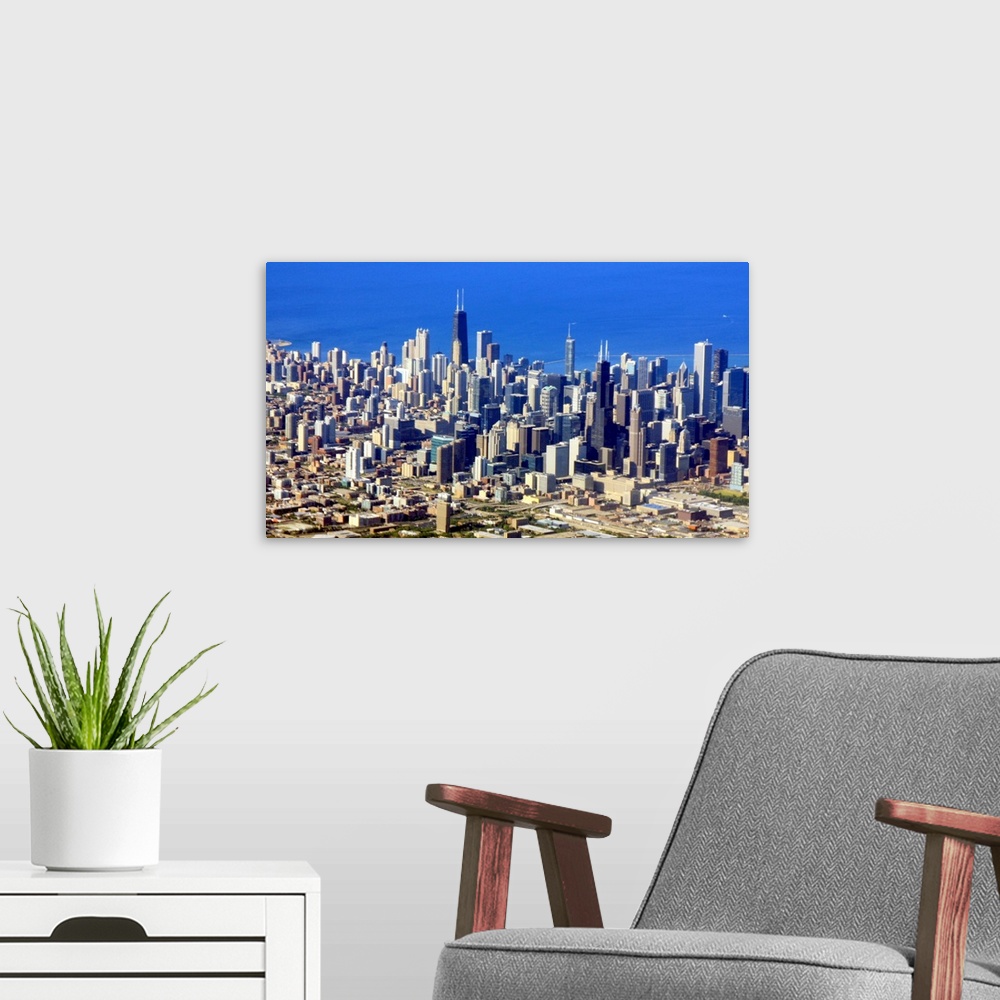 A modern room featuring Aerial view of Chicago Downtown with Lake Michigan in background.