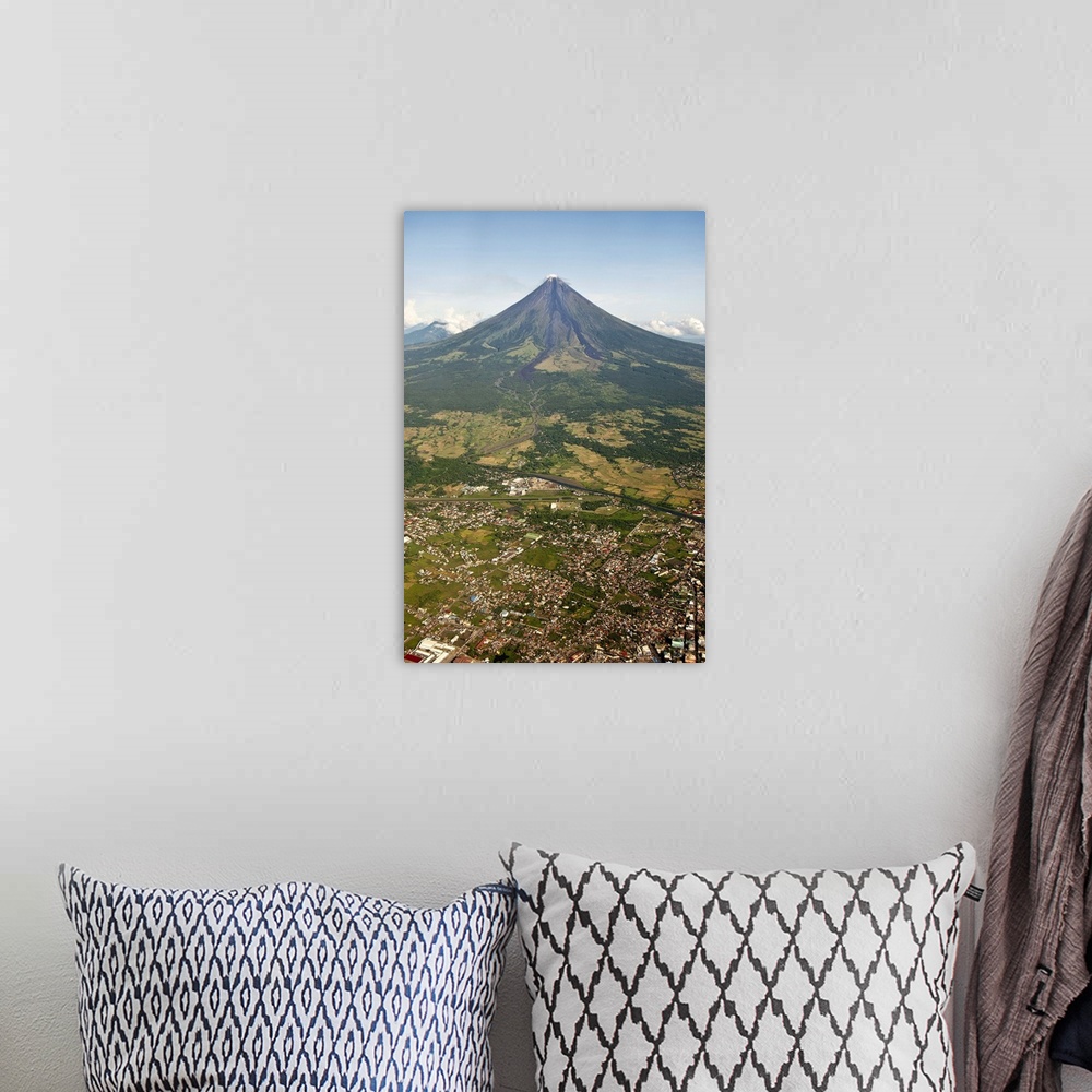 A bohemian room featuring Aerial view of mayon Volcano and Cityscape of Legazpi at morning in Philippines.