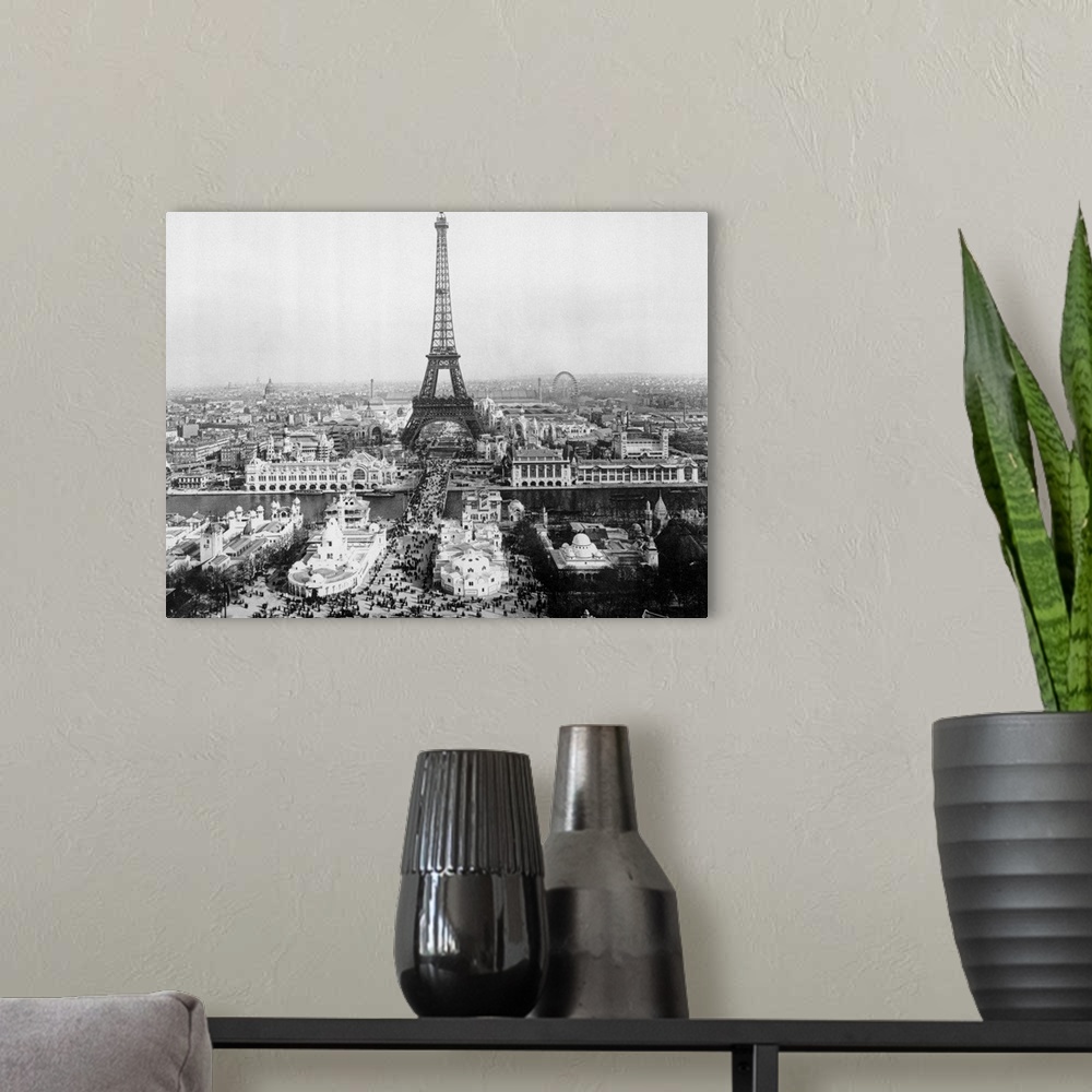 A modern room featuring Paris, France: Rooftop view of the Eiffel Tower across the Seine River from above the parks and P...