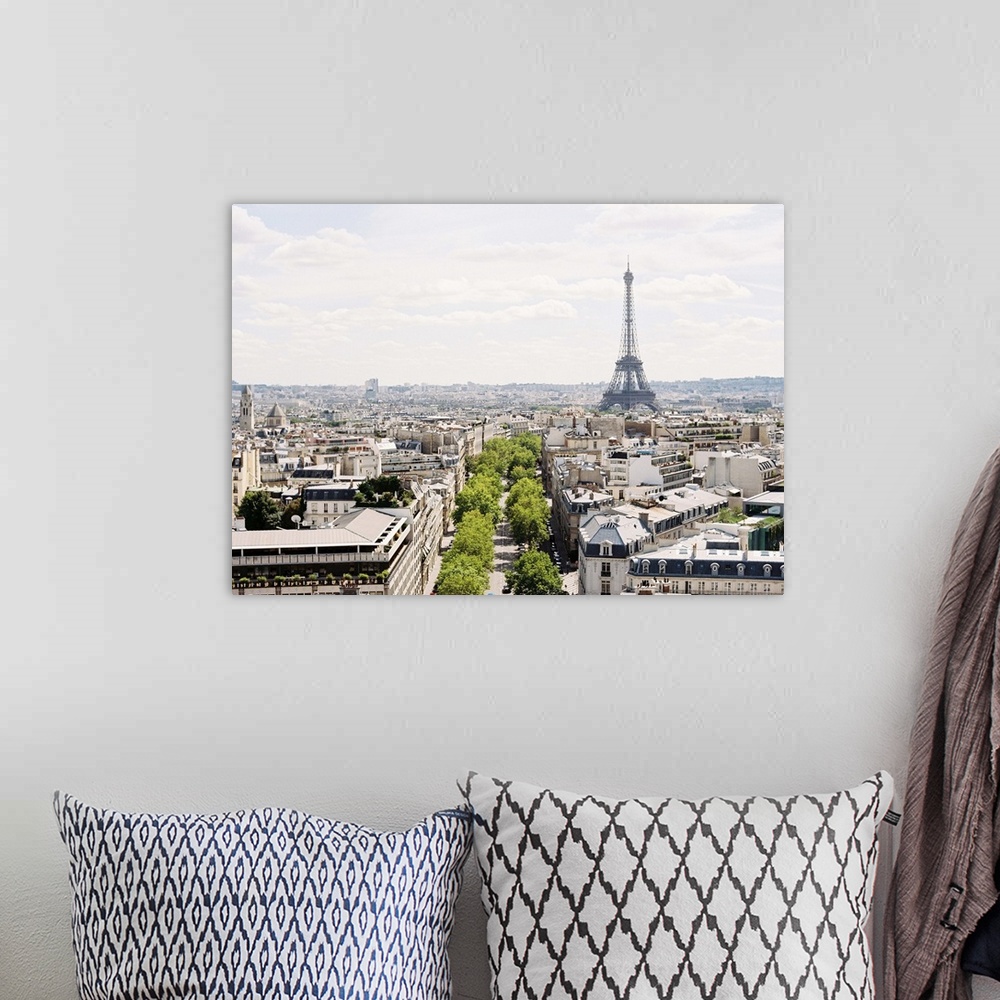 A bohemian room featuring Aerial view of Paris  and roof of Arch.