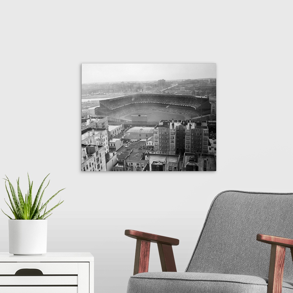 A modern room featuring Bronx, New York: General view of the Yankee Stadium before start of first World Series game.