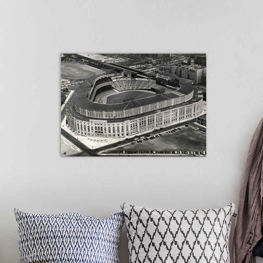 A bohemian room featuring Aerial photograph shows Yankee Stadium in New York City.