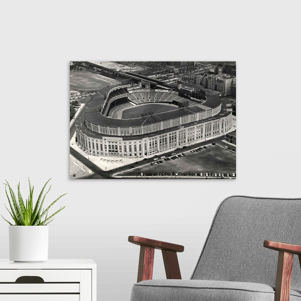 A modern room featuring Aerial photograph shows Yankee Stadium in New York City.