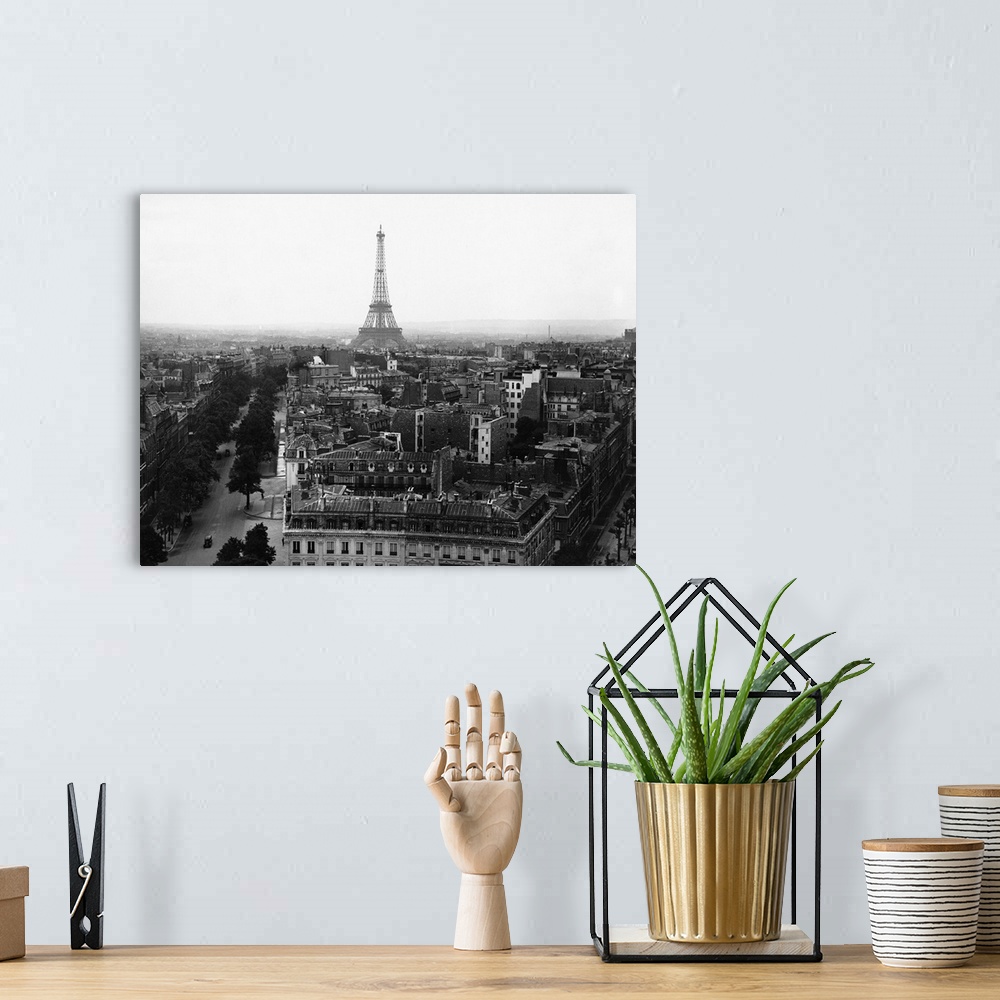 A bohemian room featuring View of the Eiffel Tower and surrounding buildings, taken from the top of the Arc de Triomphe.
