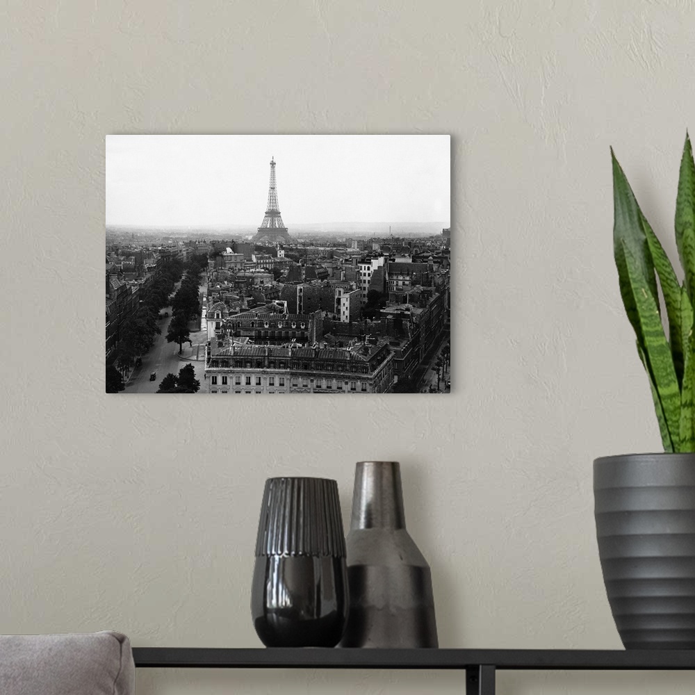 A modern room featuring View of the Eiffel Tower and surrounding buildings, taken from the top of the Arc de Triomphe.