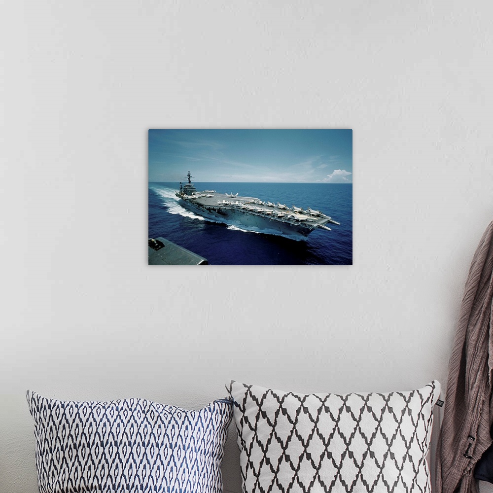 A bohemian room featuring Aircraft Carrier USS Constellation at Sea