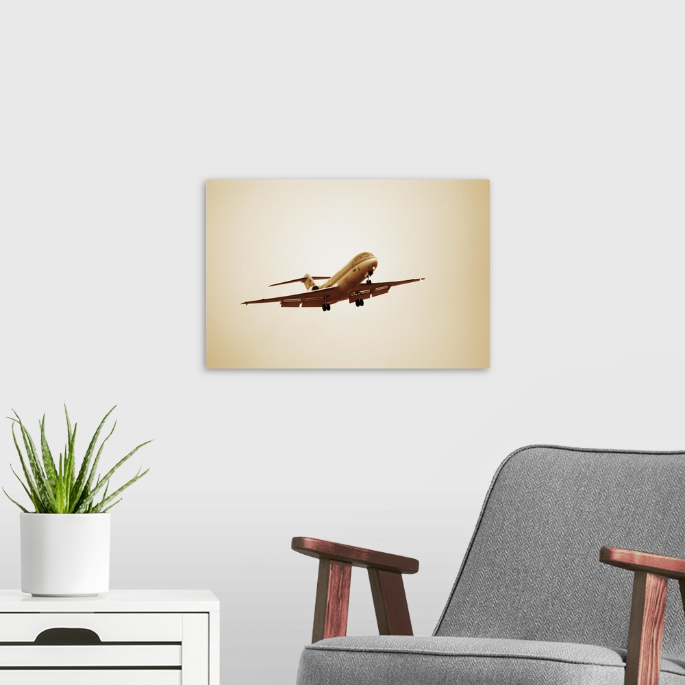 A modern room featuring Airplane flying in hazy sky