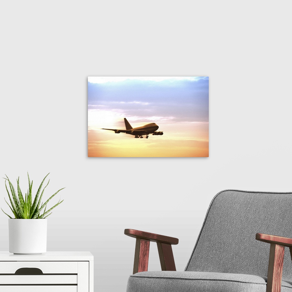 A modern room featuring Airplane in flight at dusk