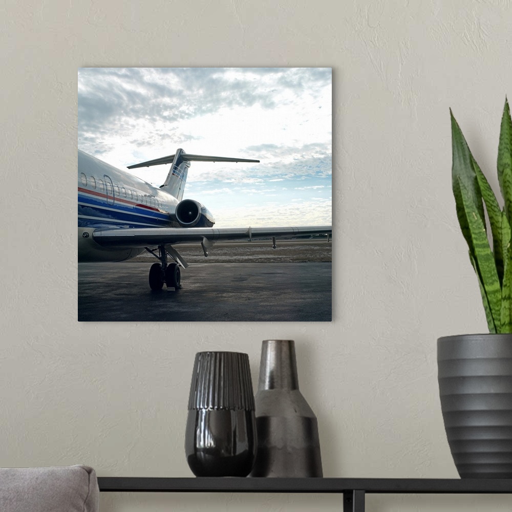 A modern room featuring Airplane on the runway of an airport