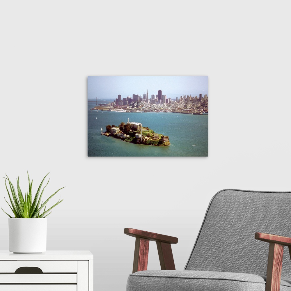 A modern room featuring Alcatraz Island and the San Francisco Bay and skyline of San Francisco, California, USA