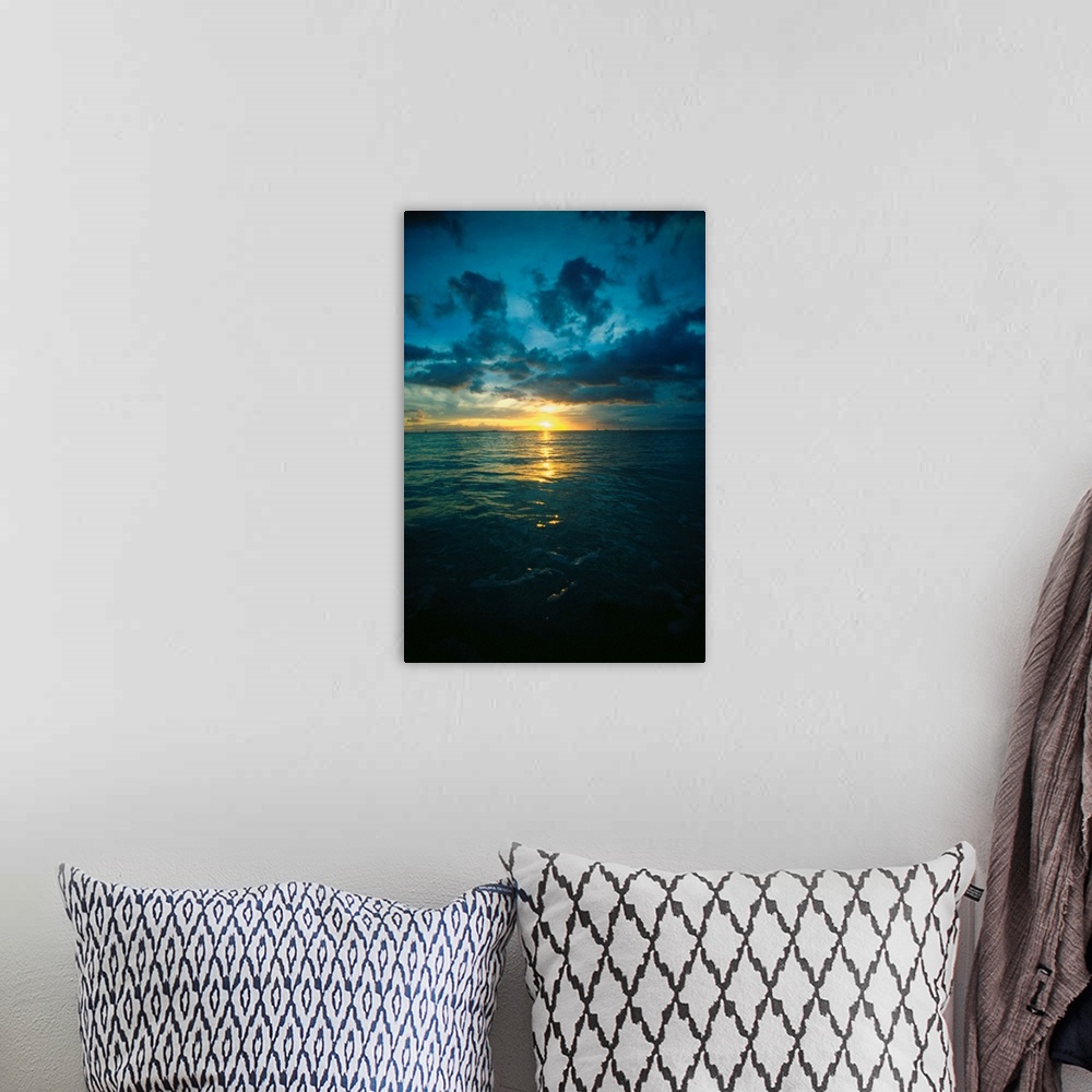 A bohemian room featuring Altostratus clouds over the ocean at sunset