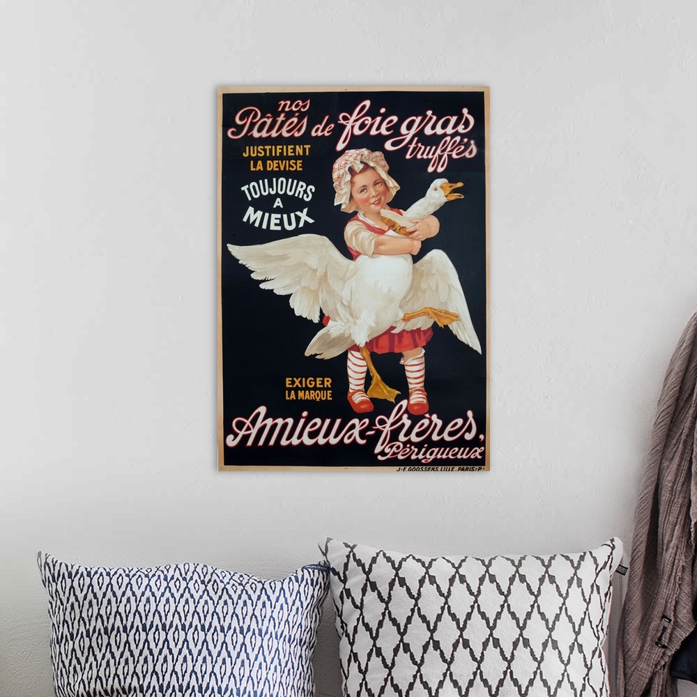 A bohemian room featuring ca 1910 advertising for Pate de Foies gras showing a young girl holding a fattened goose.