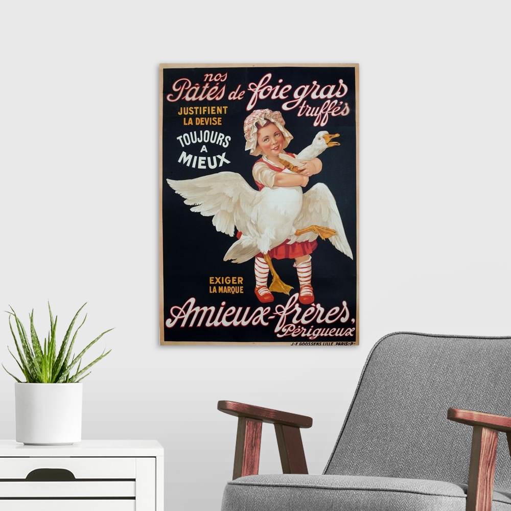 A modern room featuring ca 1910 advertising for Pate de Foies gras showing a young girl holding a fattened goose.