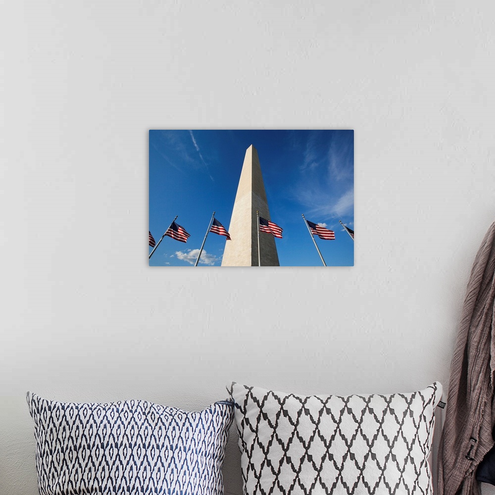 A bohemian room featuring Low angle view of American flags at base of Washington Monument at sunset on summer evening, Wash...