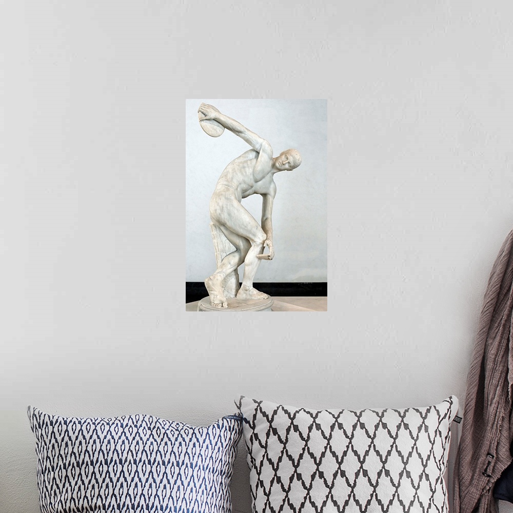 A bohemian room featuring Ancient Roman Copy Of Discobolus By Myron