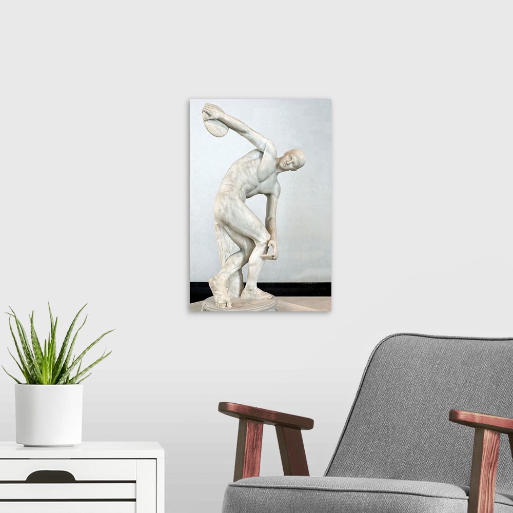 A modern room featuring Ancient Roman Copy Of Discobolus By Myron
