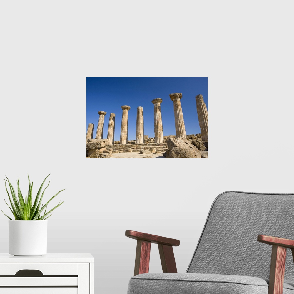 A modern room featuring Ancient ruins of columns