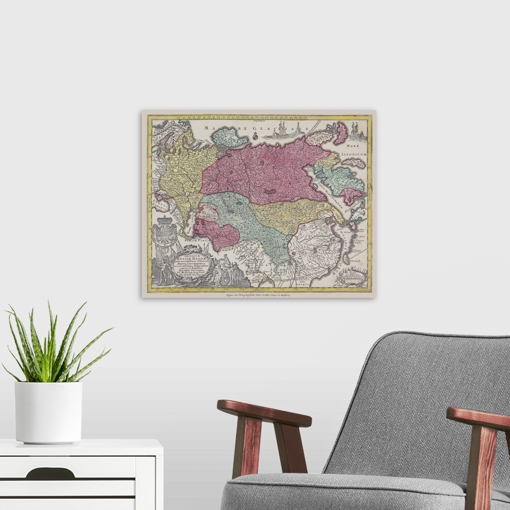 A modern room featuring An antique map of Eurasia with countries highlighted in colors.