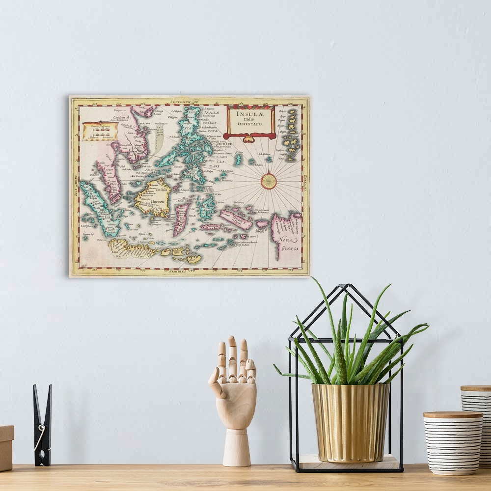 A bohemian room featuring Antique map of Indonesian islands