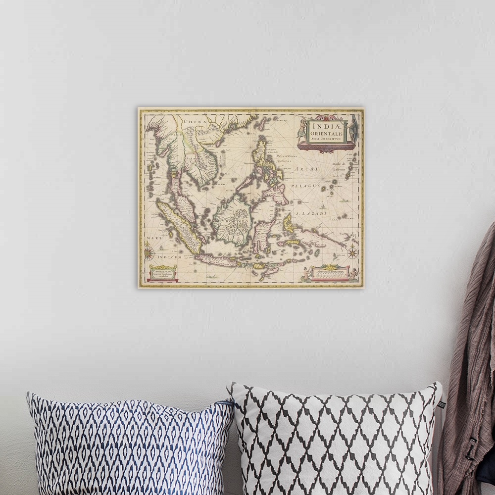 A bohemian room featuring Antique map of southeast Asia