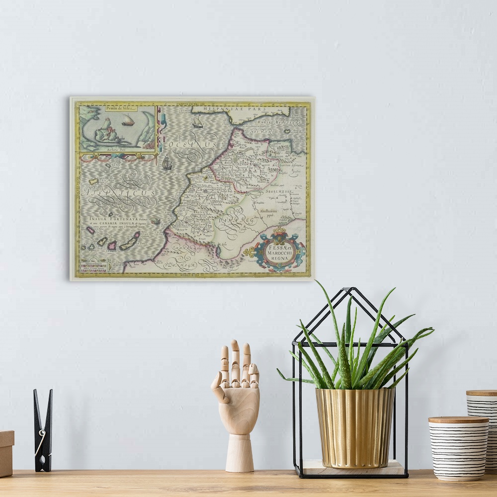 A bohemian room featuring Antique map of west Africa with present day Morocco and Canary Islands