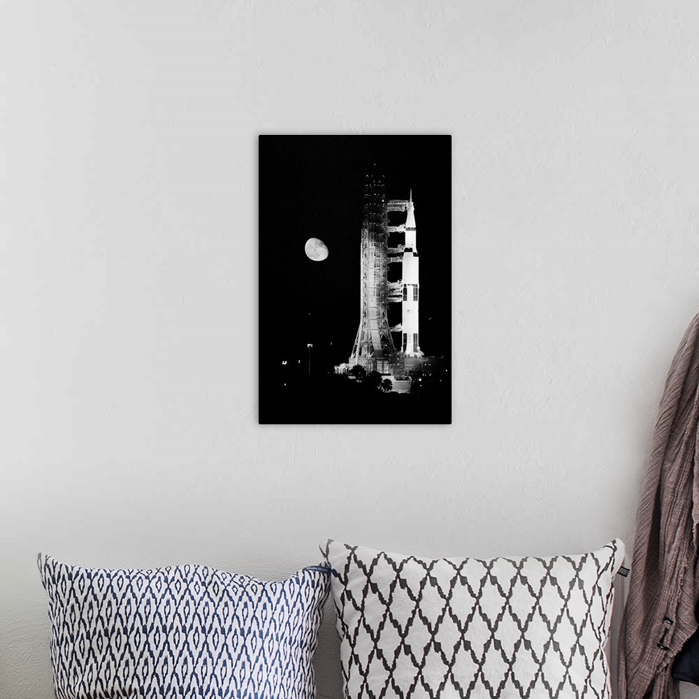 A bohemian room featuring Kennedy Space Center, Fla. Mounted atop a Saturn 5 rocket, the Apollo 11 spacecraft in which Neil...
