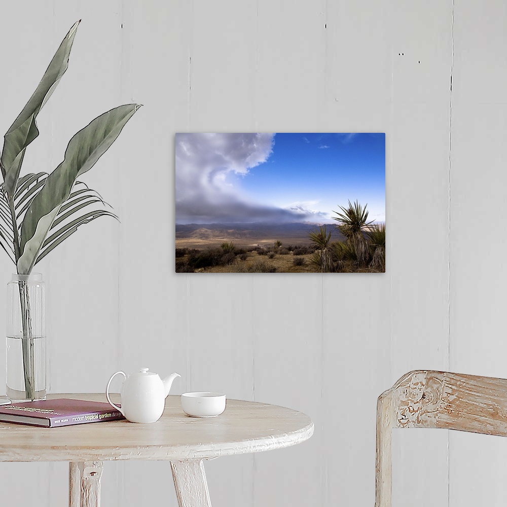 A farmhouse room featuring A storm is approaching over the desert in Joshua Tree National Park. From the top of Ryan Mountai...