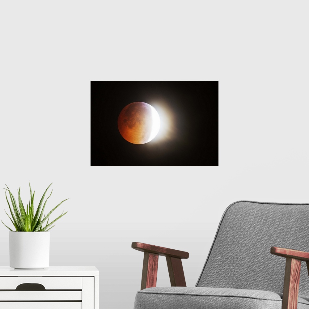 A modern room featuring Approching the Total Eclipse of the Moon