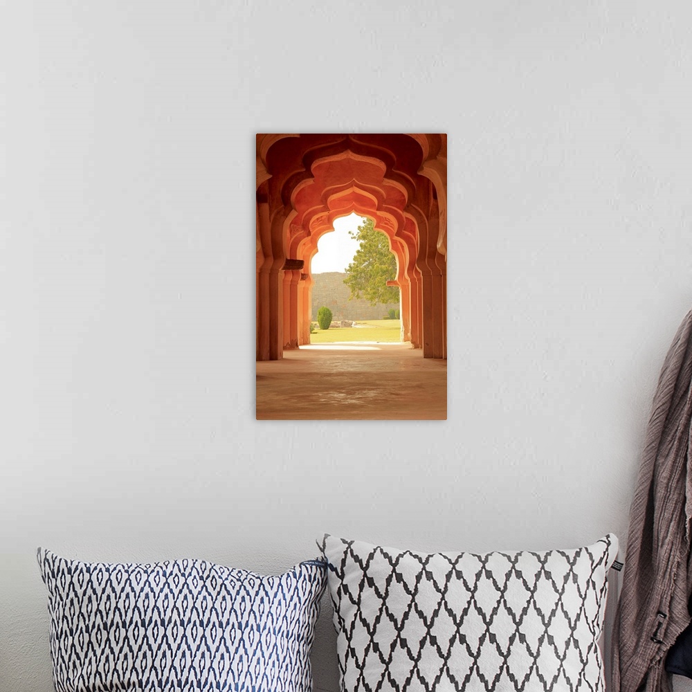 A bohemian room featuring Vertical photograph of the decorative doorways of the Lotus Temple in Hampi, Karnataka, India.