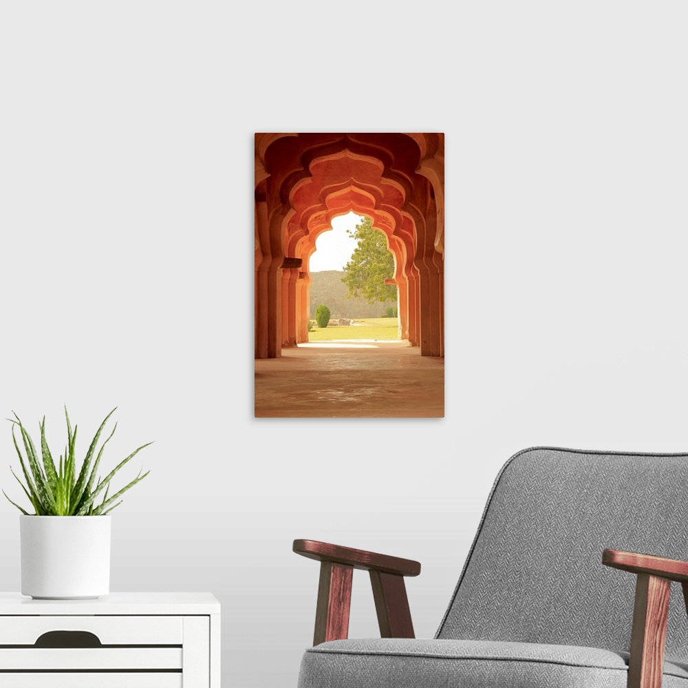 A modern room featuring Vertical photograph of the decorative doorways of the Lotus Temple in Hampi, Karnataka, India.