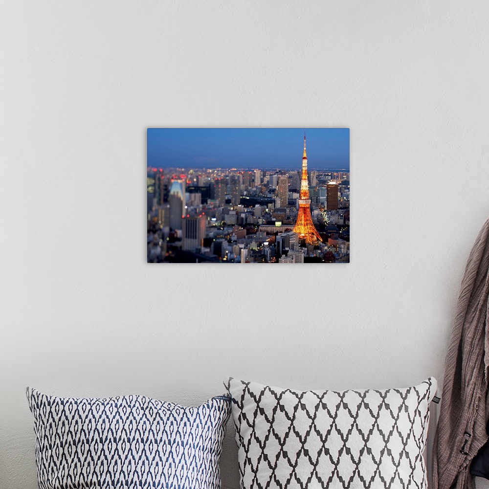 A bohemian room featuring Arial view of Tokyo at dusk sign on illuminated Tokyo Tower.