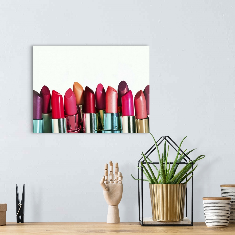 A bohemian room featuring Assorted colorful lipstick