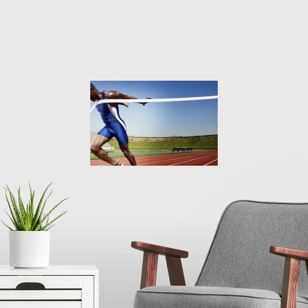 A modern room featuring Athletic man winning race