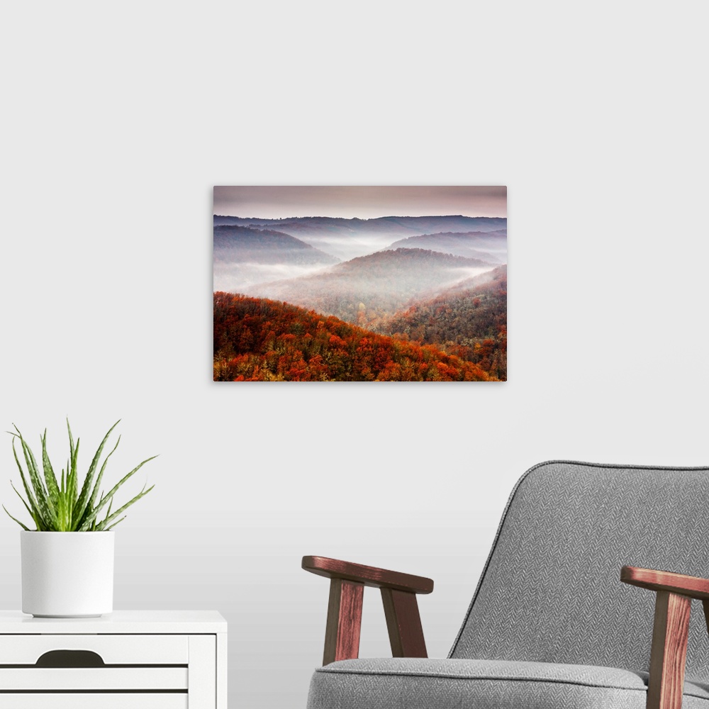 A modern room featuring Small patches of fog in mountain slopes