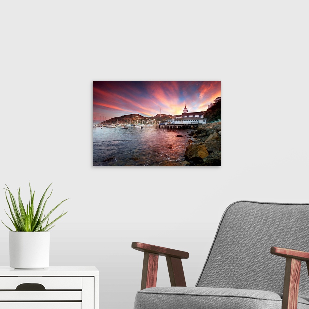 A modern room featuring Avalon harbor at sunset