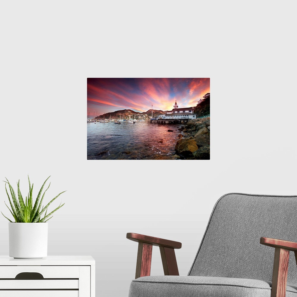 A modern room featuring Avalon harbor at sunset