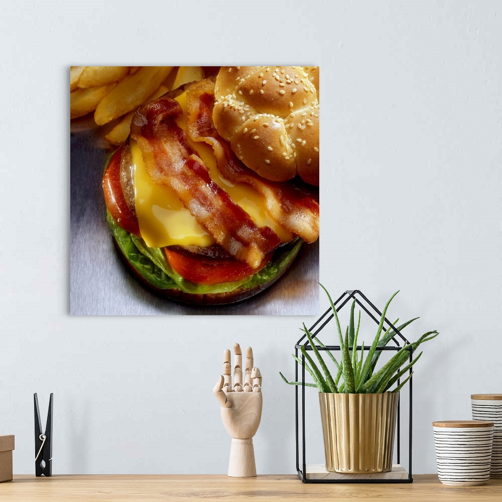 A bohemian room featuring Bacon cheeseburger with french fries