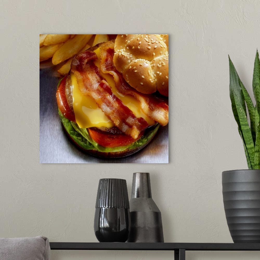 A modern room featuring Bacon cheeseburger with french fries