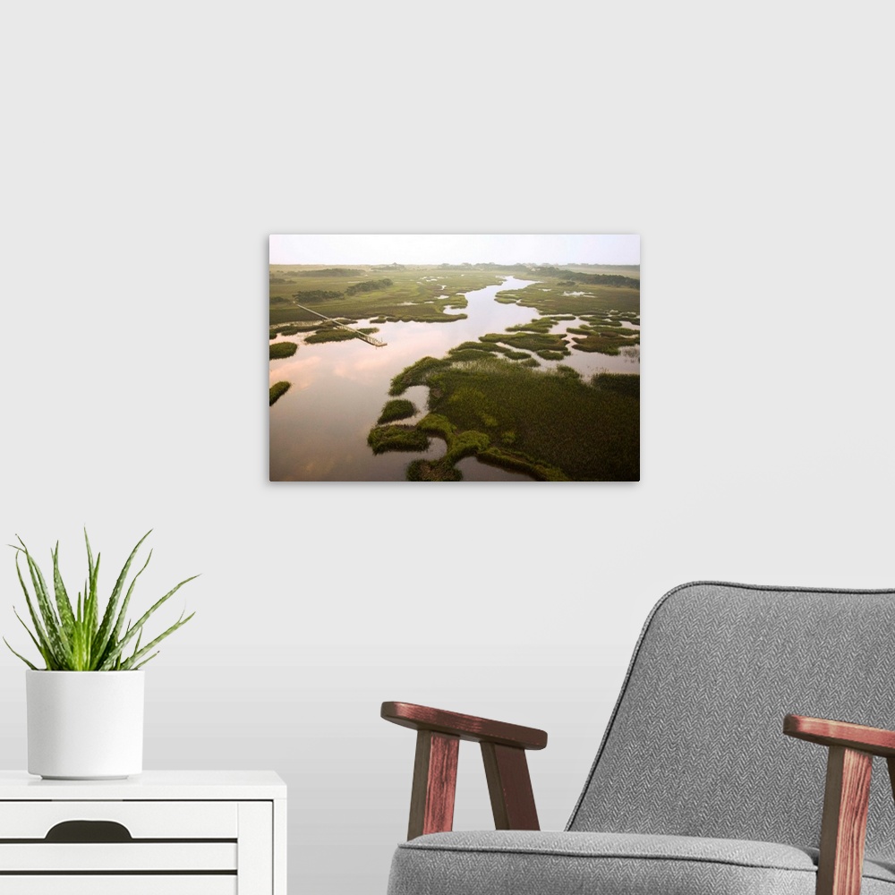 A modern room featuring Aerial view of canal, Bald Head Island, North Carolina