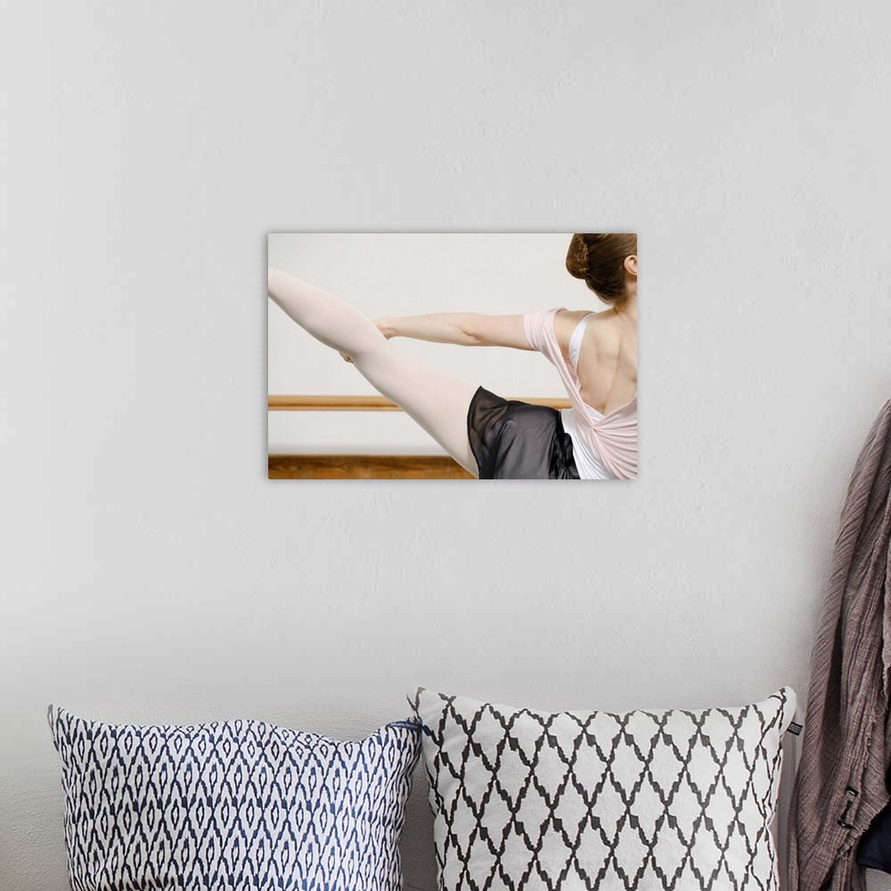 A bohemian room featuring Ballerina stretching
